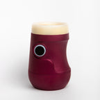 Bicchiere intelligente Drinky rosso e bianco in primo piano, vista laterale su sfondo bianco. 